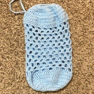 Light Blue plastic grocery bag holder.